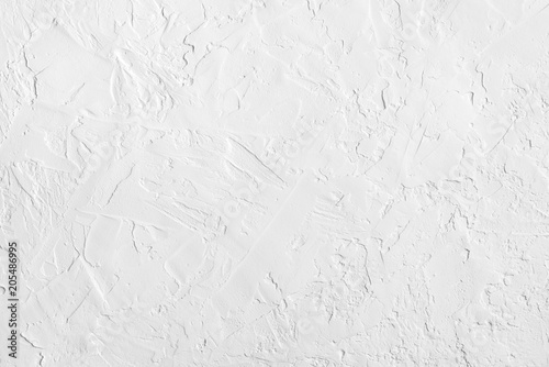 White abstract rough textured wall. Vintage background pattern photo