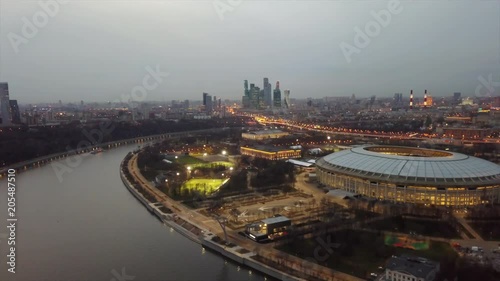 evening illuminated moscow city famous luzhniki stadium complex aerial panorama 4k russia
