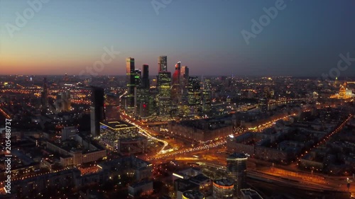 sunset sky moscow modern city traffic road ring junction aerial cityscape panorama 4k russia
