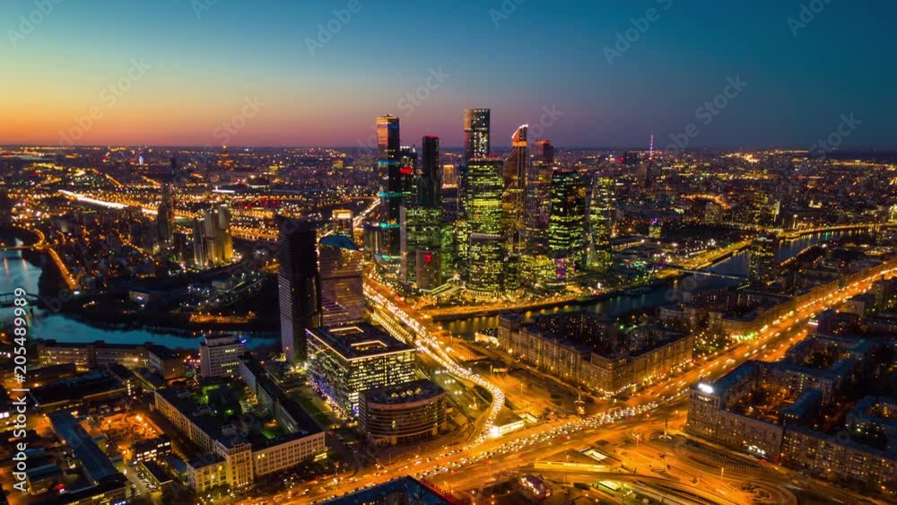 sunset sky night illuminated moscow city traffic street aerial cityscape panorama 4k timelapse russia