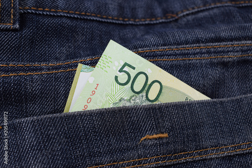 money in pants pockets, Argentine 500 pesos in jeans pockets