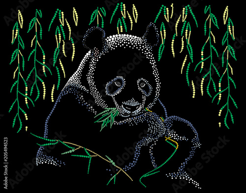 Fototapeta Naklejka Na Ścianę i Meble -  Panda eats leaves