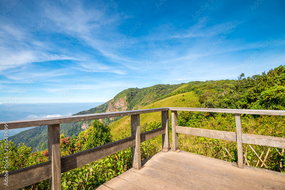Viewpoint at beautiful mountain landscape with blue sky in northern Thailand - Green nature and travel business concept