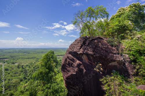 Beautiful scenery of the sandstone cliff with the jungle and blue sky in the background, Phu Sing, Bueng Kan, Thailand