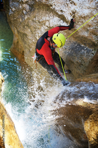 Canyoning in Formiga Canyon, Spain.