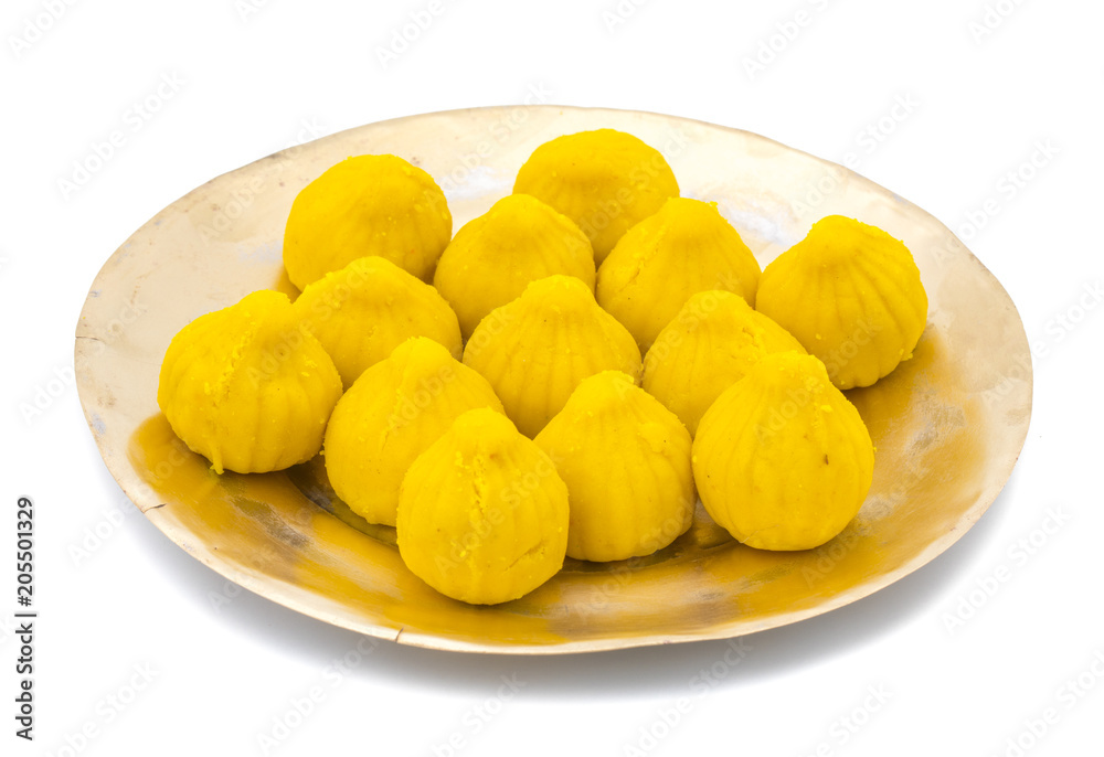 Indian Sweet Food Modak Also Know as Laddu, Khoya, khova Modak, Kozhakkatta, Modhaka, Kadubu, Modhakam, Kozhakkattai, Kudumu. Made up of Coconut And Jaggery, Rice Flour, Wheat with Khava Indian Sweet Food Modak Also Know as Laddu, Khoya, khova Modak, Kozhakkatta, Modhaka, Kadubu, Modhakam, Kozhakkattai, Kudumu. Made up of Coconut And Jaggery, Rice Flour, Wheat with Khava