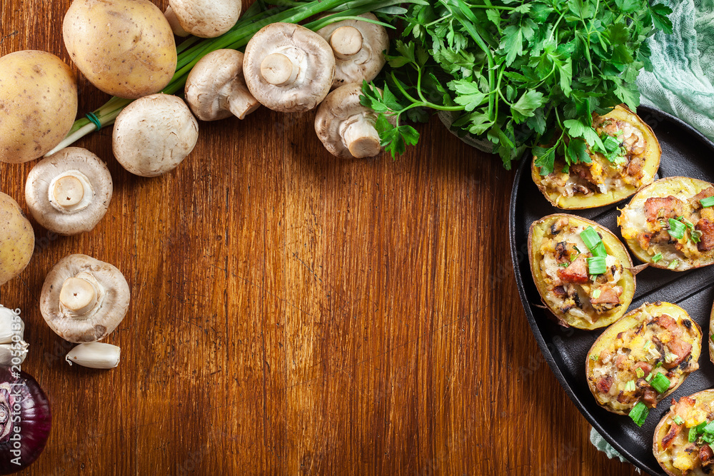 Baked potatoes in jacket stuffed with bacon, mushrooms and chees Baked potatoes in jacket stuffed with bacon, mushrooms and chees