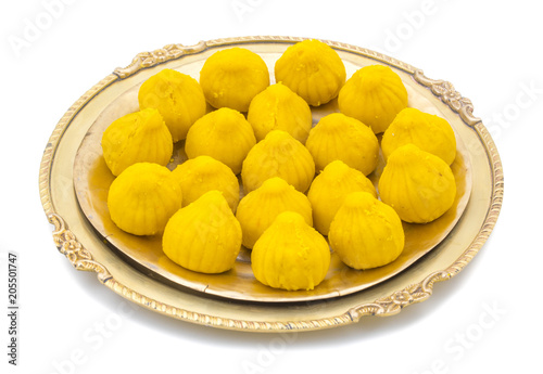 Indian Sweet Food Modak Also Know as Laddu, Khoya, khova Modak, Kozhakkatta, Modhaka, Kadubu, Modhakam, Kozhakkattai, Kudumu. Made up of Coconut And Jaggery, Rice Flour, Wheat with Khava photo