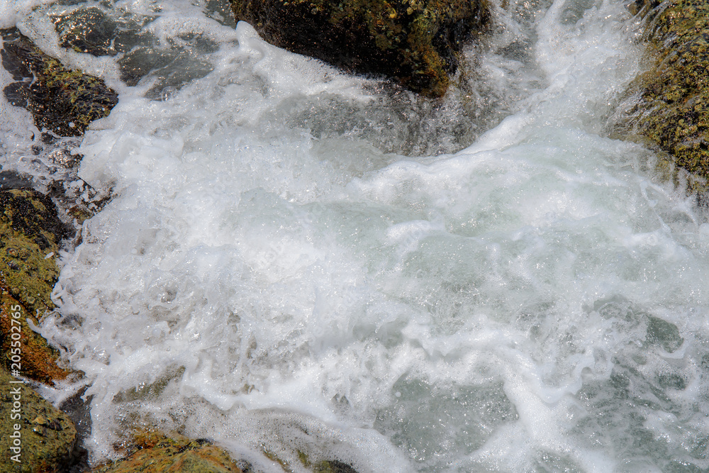 Sea wave with rock at sand beach with high speed shutter. Stock Photo ...