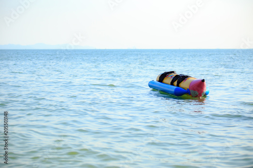 Banana boat on the sea or ocean water.