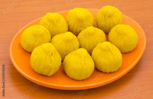 Indian Sweet Food Modak Also Know as Laddu, Khoya, khova Modak, Kozhakkatta, Modhaka, Kadubu, Modhakam, Kozhakkattai, Kudumu. Made up of Coconut And Jaggery, Rice Flour, Wheat with Khava photo