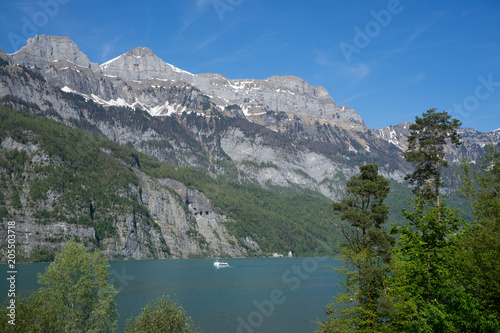 Ferry from Walenstadt to Unterterzen and Murg at the Walensee lake in Switerland photo