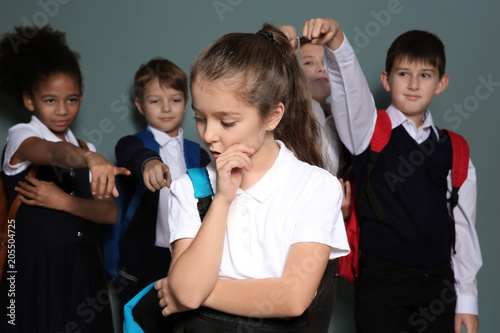 Children bullying their cla...