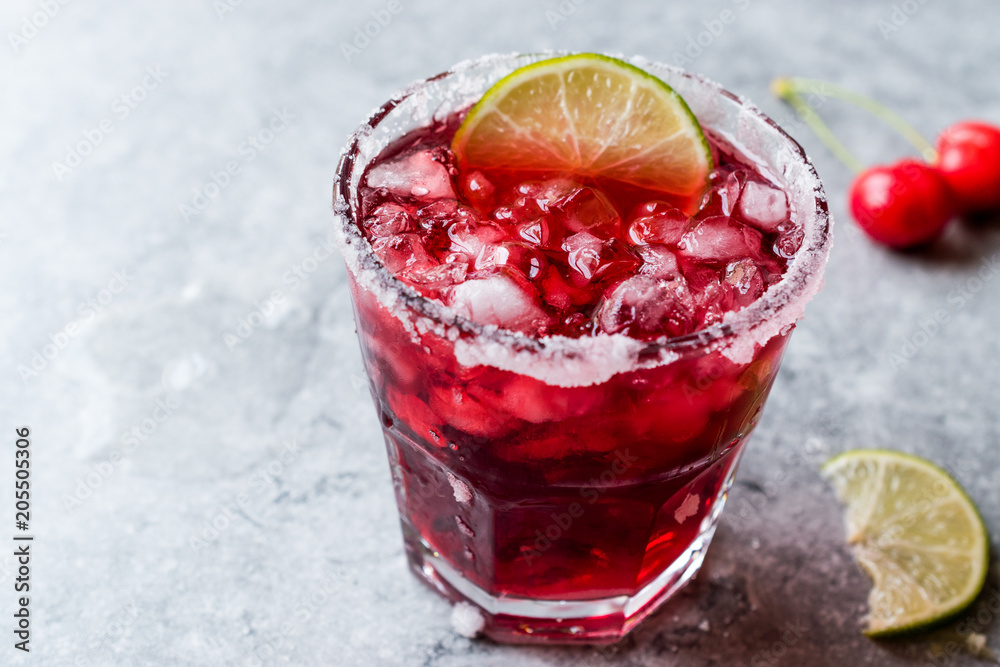 Cherry Margarita Cocktail with Tequila, Lime, Salt, Cherry Juice and Crushed Ice. Cherry Margarita Cocktail with Tequila, Lime, Salt, Cherry Juice and Crushed Ice.