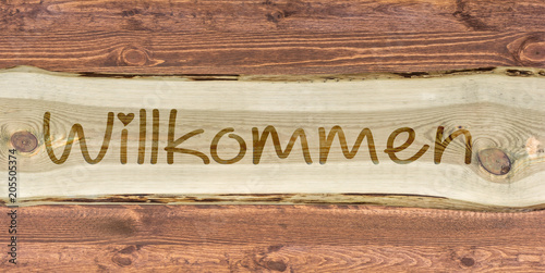Obraz na plátně Holzschild mit der Aufschrift Willkommen