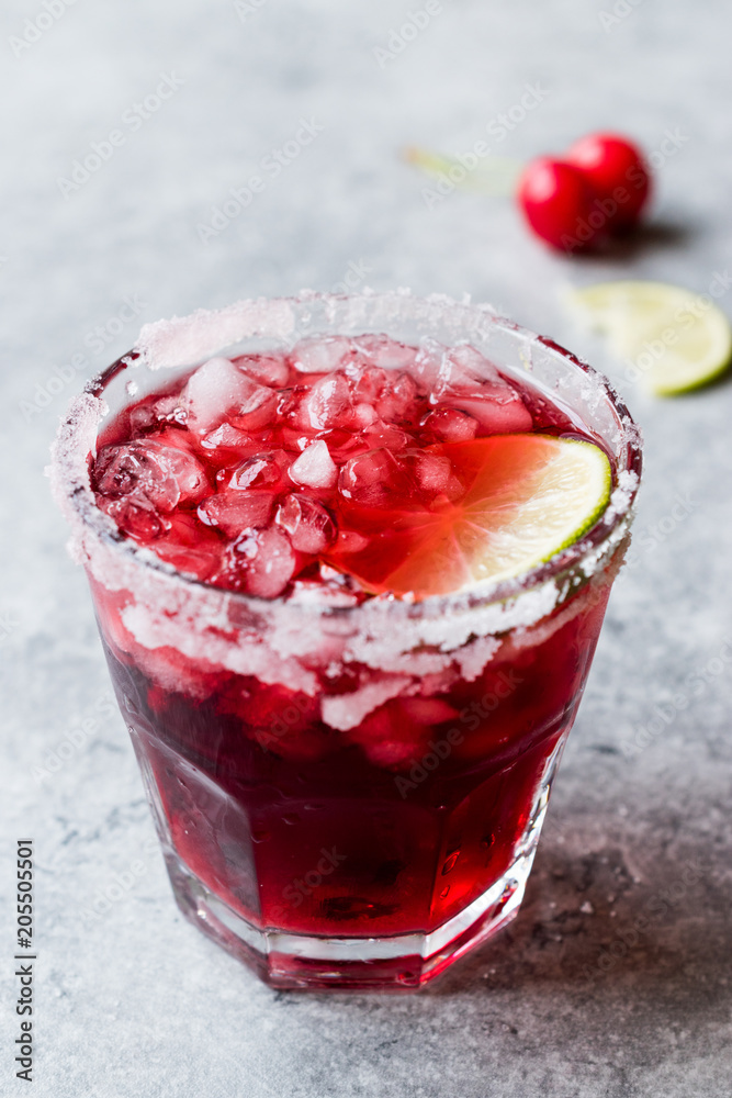 Cherry Margarita Cocktail with Tequila, Lime, Salt, Cherry Juice and Crushed Ice. Cherry Margarita Cocktail with Tequila, Lime, Salt, Cherry Juice and Crushed Ice.