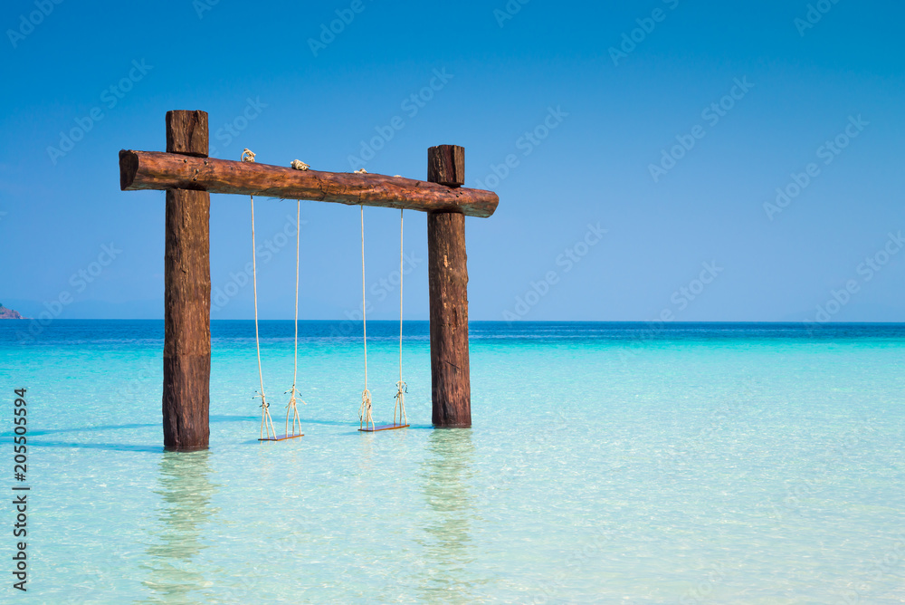 Big swing on beautiful tropical island white sand beach blue sky sunny day - Summer breeze holiday