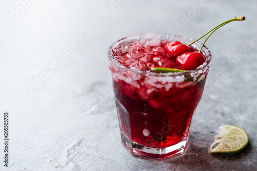 Cherry Margarita Cocktail with Tequila, Lime, Salt, Cherry Juice and Crushed Ice.