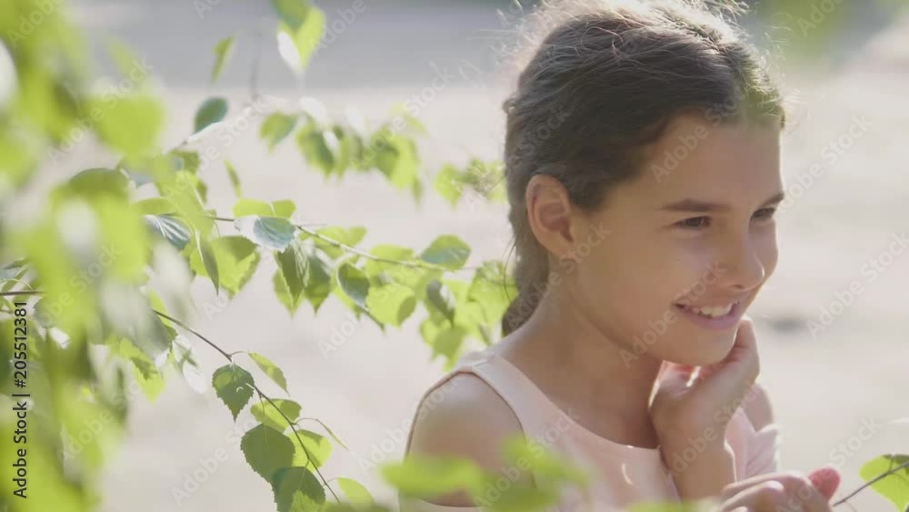 portrait beautiful little girl Russia twig birch tree leaves lifestyle summer slow motion video emotion portrait beautiful little girl Russia twig birch tree leaves lifestyle summer slow motion video emotion