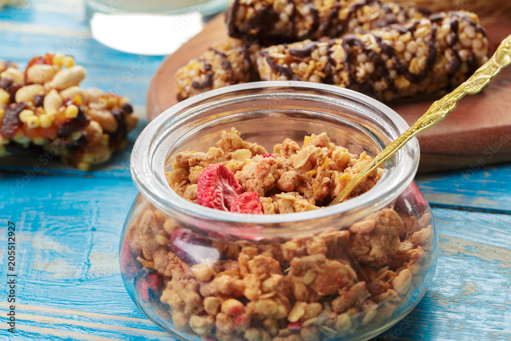Granola bar on wooden background Granola bar on wooden background