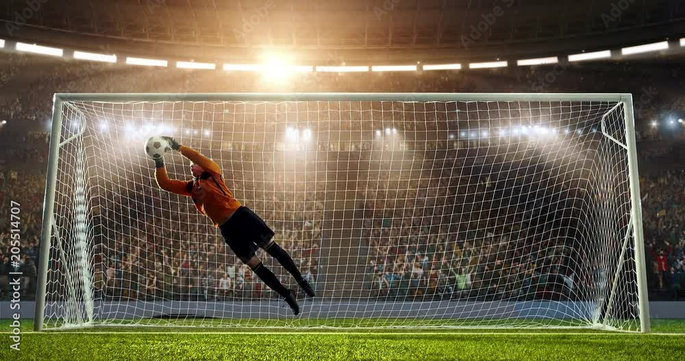 Soccer goalkeeper jumps and fails to catch ball on a professional soccer stadium. Stadium and crowd is made in 3D and animated