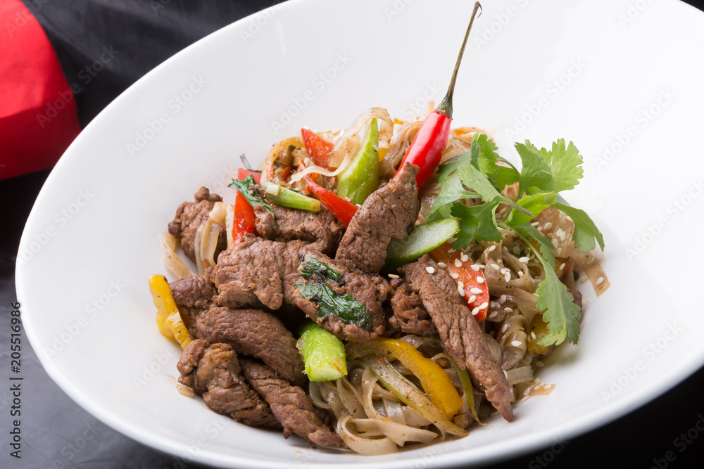 Thai spicy noodles dish with meat