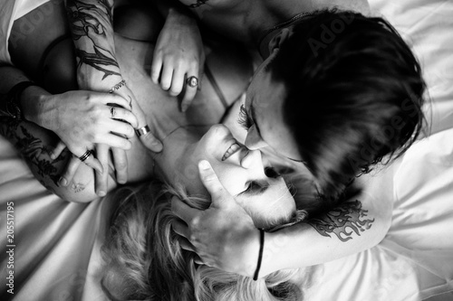 Close up portrait of a sexy young couple kissing.