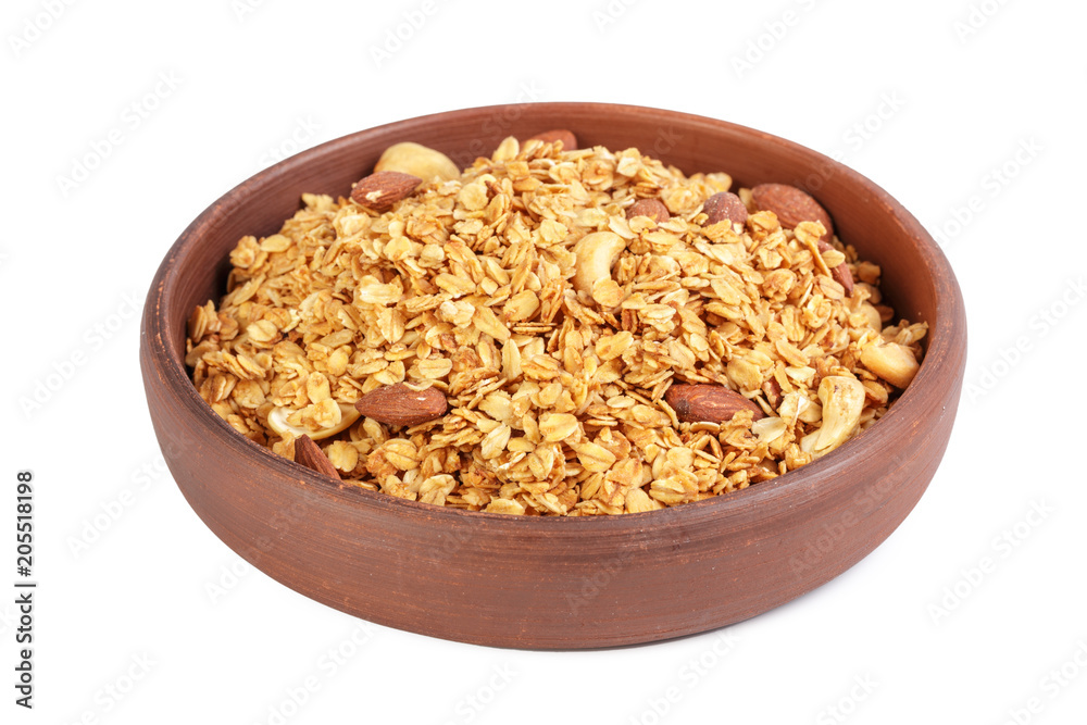 Bowl of whole grain muesli isolated on white background Bowl of whole grain muesli isolated on white background