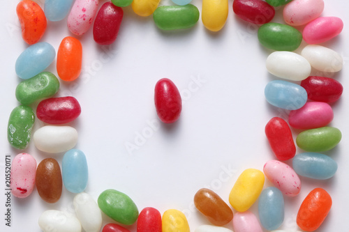 close up on assorted colored candies © Andrea