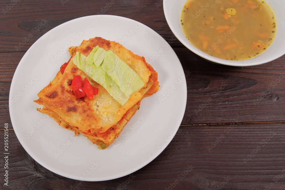 Lasagna with vegetables on a table Lasagna with vegetables on a table