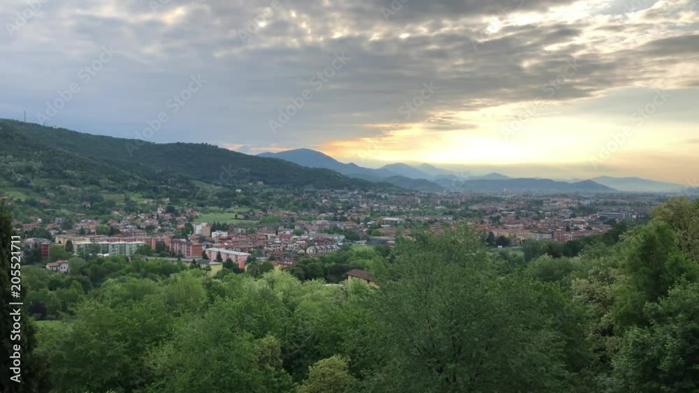 View on Bergamo at sunset, Lombardy, Italy.Bergamo is an Italian city northeast of Milan, in the Lombardy region. Its older upper district, called Citta Alta, is characterized by cobblestone streets. View on Bergamo at sunset, Lombardy, Italy.Bergamo is an Italian city northeast of Milan, in the Lombardy region. Its older upper district, called Citta Alta, is characterized by cobblestone streets.