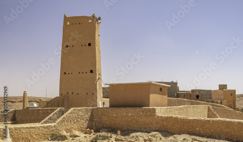 Tower on the top of medieval town Beni Isguen in province Ghardaia, Algeria photo