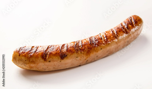 Fotografiet Spicy cooked German bratwurst sausage