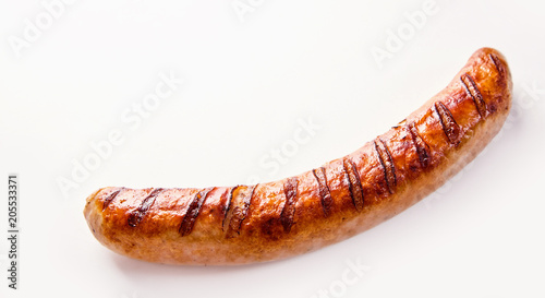 Fotografia Single German bratwurst sausage on white