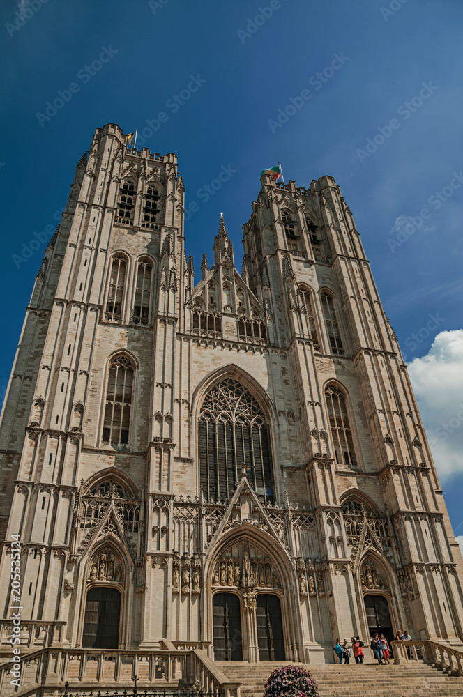Gothic facade of St. Michael and St. Gudula’s Cathedral and blue sunny sky in Brussels. Vibrant and friendly, is the country’s capital and administrative center of the EU. Central Belgium.