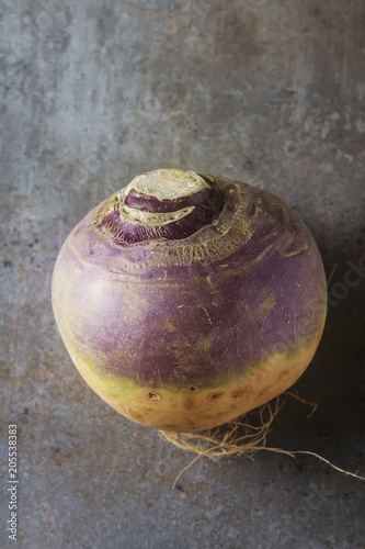 Ripe purple turnips with green leaves