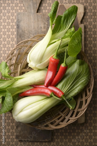 Fresh bok choy and chilli peppers from Indonesia photo