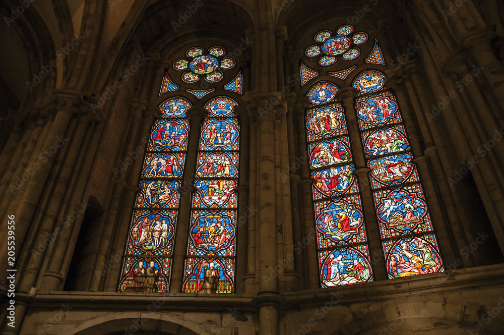 Colorful stained glass window in the St. Michael and St. Gudula Cathedral at Brussels. It is the country’s capital and administrative center of the EU. Central Belgium