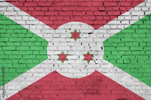 Burundi flag is painted onto an old brick wall photo