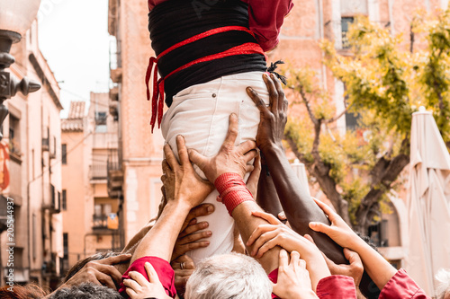 People building human tower in Catalonia photo