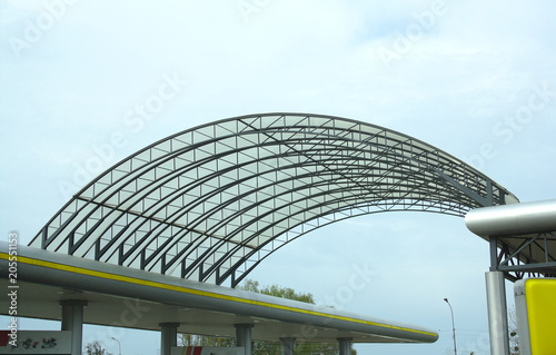 arch of plastic over refueling of cars