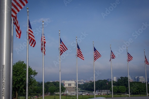 RIng of flags on national mall with lincolin memorial in the background