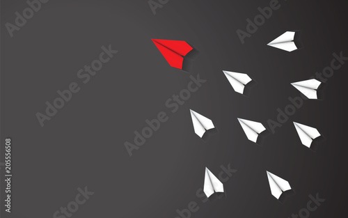 Leadership of Red paper airplane concept between white paper airplane. Key man and Business successful with one direction together. Black texture illustration background vector. photo