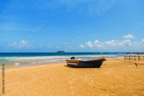 fishery, fishing wooden boat on the tropical coast