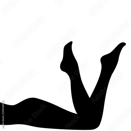 Sexy female legs on the beach  silhouette