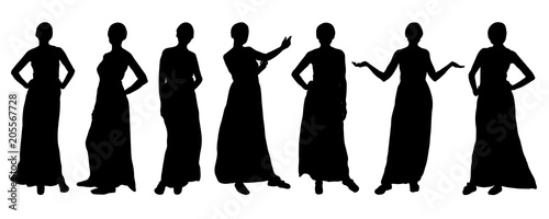 Silhouettes of girls fashion models, different poses. Vector.