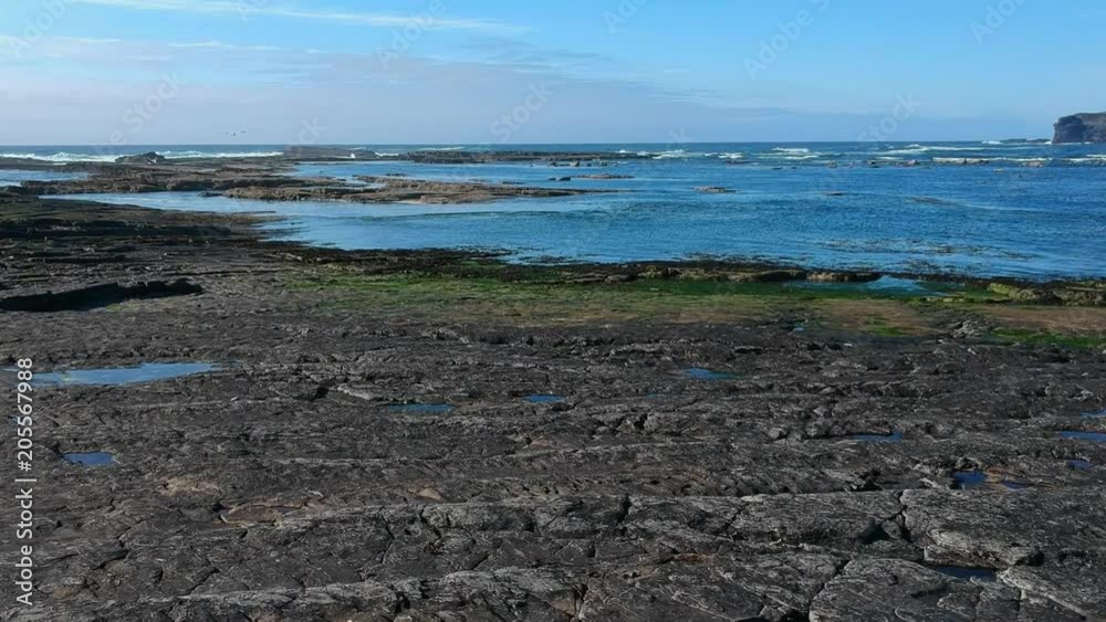 Flight over the rocky beach of Kilkee Ireland Flight over the rocky beach of Kilkee Ireland