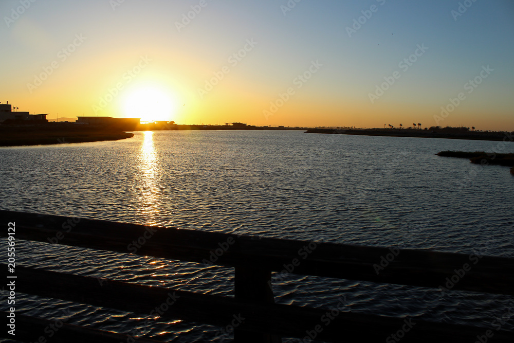 sunset over Bolsa Chica Wetlands in Huntington Beach California 