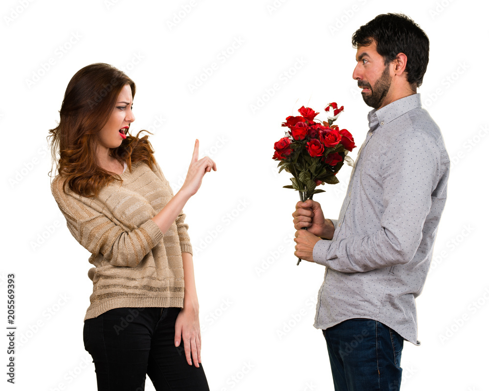 Man giving flowers to a girl Stock Photo | Adobe Stock