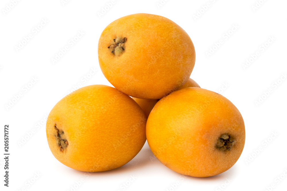 A bunch of ripe medlar on a white, isolated. A bunch of ripe medlar on a white, isolated.
